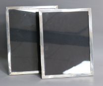 A pair of silver mounted rectangular photograph frames, Mappin & Webb, Birmingham, 1932, 33.5cm.