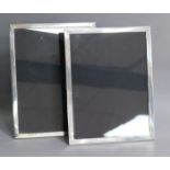 A pair of silver mounted rectangular photograph frames, Mappin & Webb, Birmingham, 1932, 33.5cm.