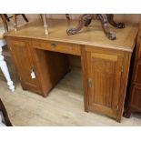 An Art Deco oak pedestal desk W.130cm