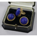 A yellow metal and lapis lazuli oval dress ring and a pair of 9ct gold and lapis lazuli earclips.