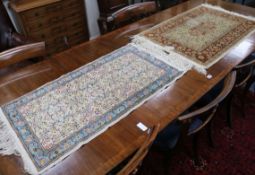 Two small Persian silk rugs 100cm x 66cm and 100cm x 53cm