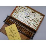 A Mahjong set and an abacus Mahjong box W.26cm x D.18cm