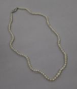 A single strand natural pearl necklace with 18ct white gold and gem set clasp and GCS certificate
