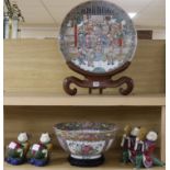 A Chinese saucer shaped dish and a bowl and two pairs of Chinese figures of boys charger diameter