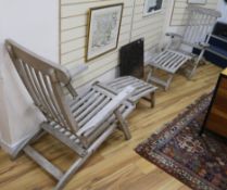 A pair of teak steamer chairs W.59cm