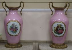 A pair of large Limoges pink ground vases height 62cm