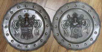 Two Armorial pewter plates diameter 39cm