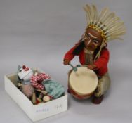 A tin toy, an Indian drummer and three Pelham puppets