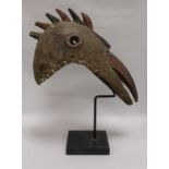 An African art bird mask on stand overall height 48cm