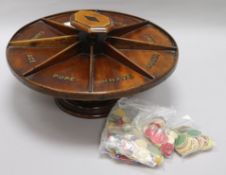 A Victorian mahogany 'Pope Joan' game revolving stand