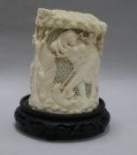 A pre 1945 African ivory carving of a hunting scene, possibly made by an Indian carver working in