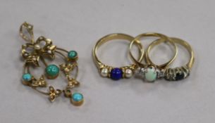 Three 9ct gold and gem rings and a 9ct gold gem set pendant.