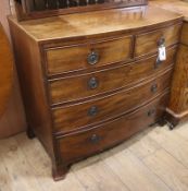 A small bow fronted mahogany chest of drawers W.87cm