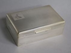 A late 1950's engine turned silver rectangular cigarette box, Mappin & Webb, 1959, 14cm.