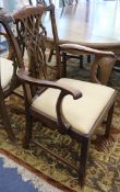 A set of six Chippendale style carved mahogany dining chairs (two having arms)