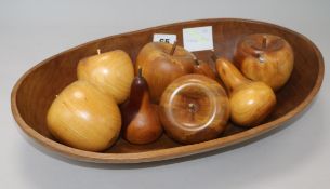 Eight New Zealand turned wood 'fruit' and a bowl (9) length 39cm