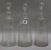 Three cut glass named spirit decanters, 'Brandy', 'Whisky' and 'Gin' height 30cm