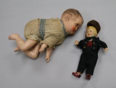 A 1930's automaton doll and another