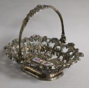 A 19th century Austro-Hungarian pierced white metal basket, the base with inset porcelain plaque,