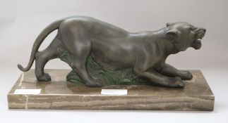 A model of a panther on marble base length 40cm