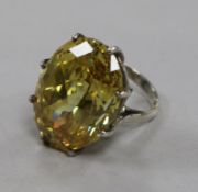 A silver and citrine coloured paste dress ring, size K.