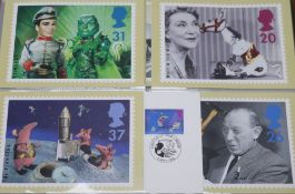 Twelve albums of UK first day covers and Royal Mail postcards