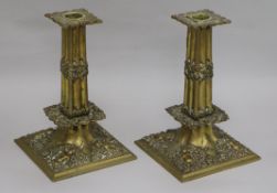 A pair of Charles II style cast brass candlesticks height 21cm