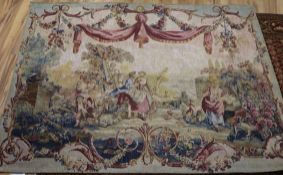 After Boucher, a tapestry wall hanging worked with figures beneath drapery swags 4ft 10in. x 5ft