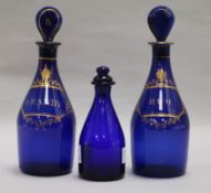 Two Bristol Blue decanters and a scent bottle decanters height 24cm