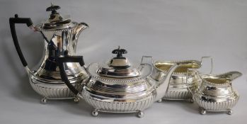 A late Victorian Scottish silver four piece tea set, Hamilton & Inches, Edinburgh, 1895, 62 oz.