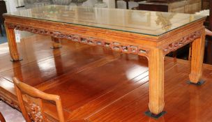 A Chinese hardwood coffee table W.153cm