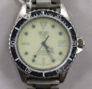 A gentleman's stainless steel Heuer 1000 quartz Professional wrist watch.