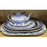 A collection of Victorian and later blue and white Willow pattern and other ceramics