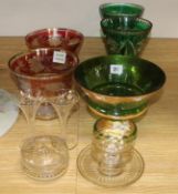 A pair of green overlay cut glass vases and a pair of etched cranberry and frosted glass bowls