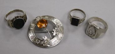 A masonic bloodstone matrix ring, a cameo ring, a Scottish cloak brooch and another ring.