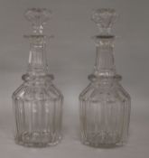 Two glass bell shaped decanters height 28cm