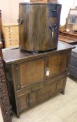 A Korean elm side cabinet and a cylindrical pine/elm chest with wrought iron mounts and hinged