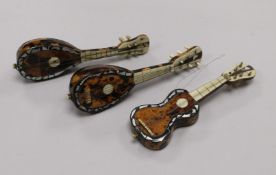 Three tortoiseshell miniature instruments
