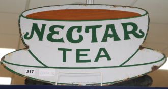 A Nectar Tea enamel sign in the shape of a teacup