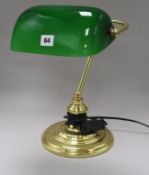 A brass and green glass lamp height 34cm