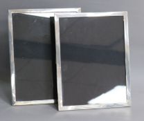 A near pair of silver mounted rectangular photograph frames, Mappin & Webb, Birmingham, 1932, 33.