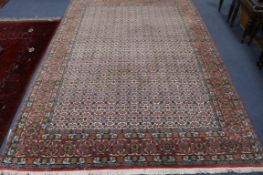 A Caucasian pink ground carpet 300 x 200cm