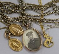 A 9ct gold chain, a silver gilt dragon pendant chain, a gilt St. Christopher chain, a guard chain, a