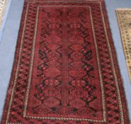 A red ground Persian rug 180 x 120cm