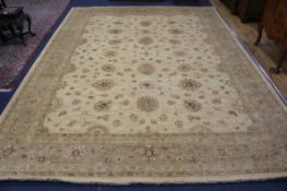 A Usak cream ground carpet 370 x 270cm