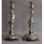 A pair of late Victorian silver Sabbath Day candlesticks, Moses Salkind, London, 1900, 35cm.