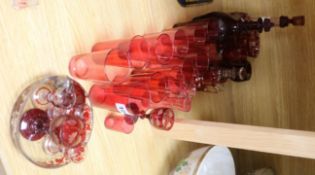 A collection of etched ruby and cranberry glassware