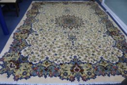 A Persian ivory ground carpet 390 x 290cm