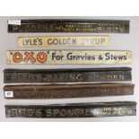 Five shelf advertising signs for Baking Powder, Sponge Mixture, Caramels, Pudding Mix and Oxo