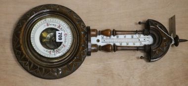 An oak barometer W.23cm